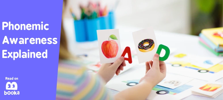 Child learning phonemic awareness using picture cards with letters