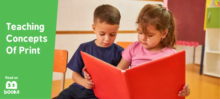 Two preschool children practice print awareness skills by reading a large book together in a classroom setting.