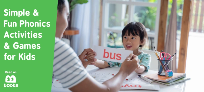 Mother and daughter do phonics activities at home, using flashcards to learn new words.